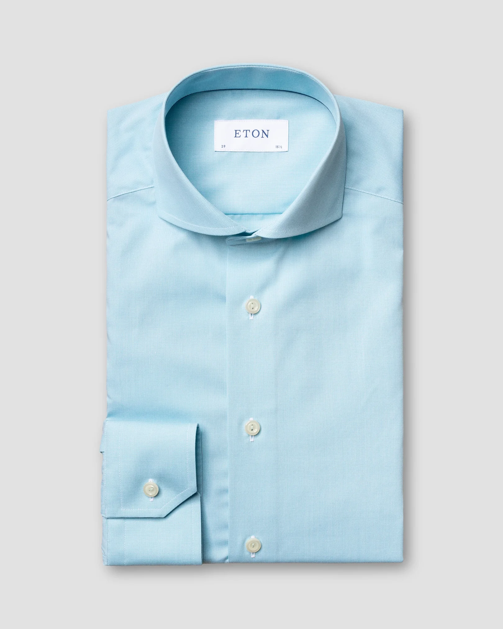 Eton - pastel green shirt navy details extreme cut away