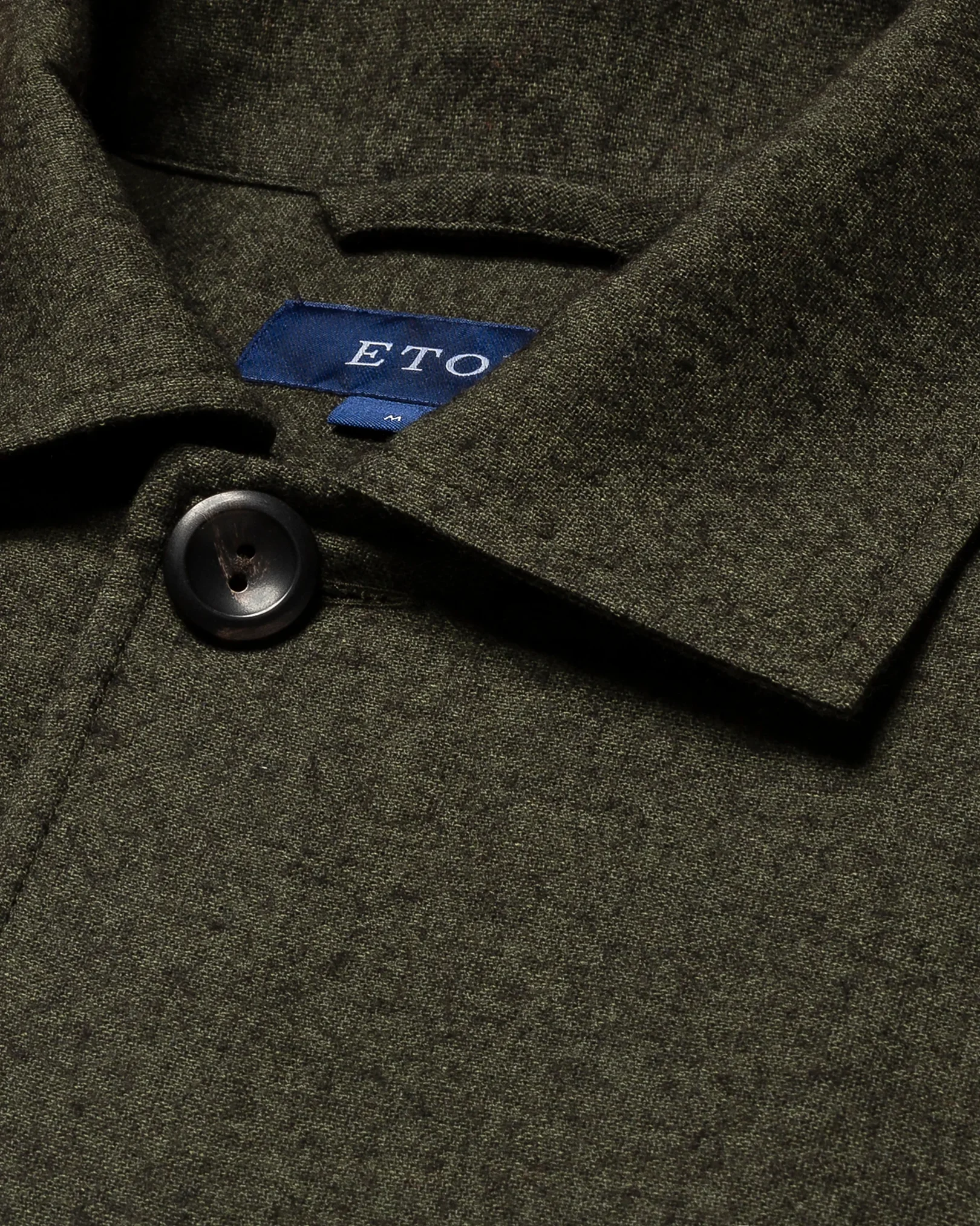 Eton - dark green flannel collar with no collarstand single cuff pointed strap regular