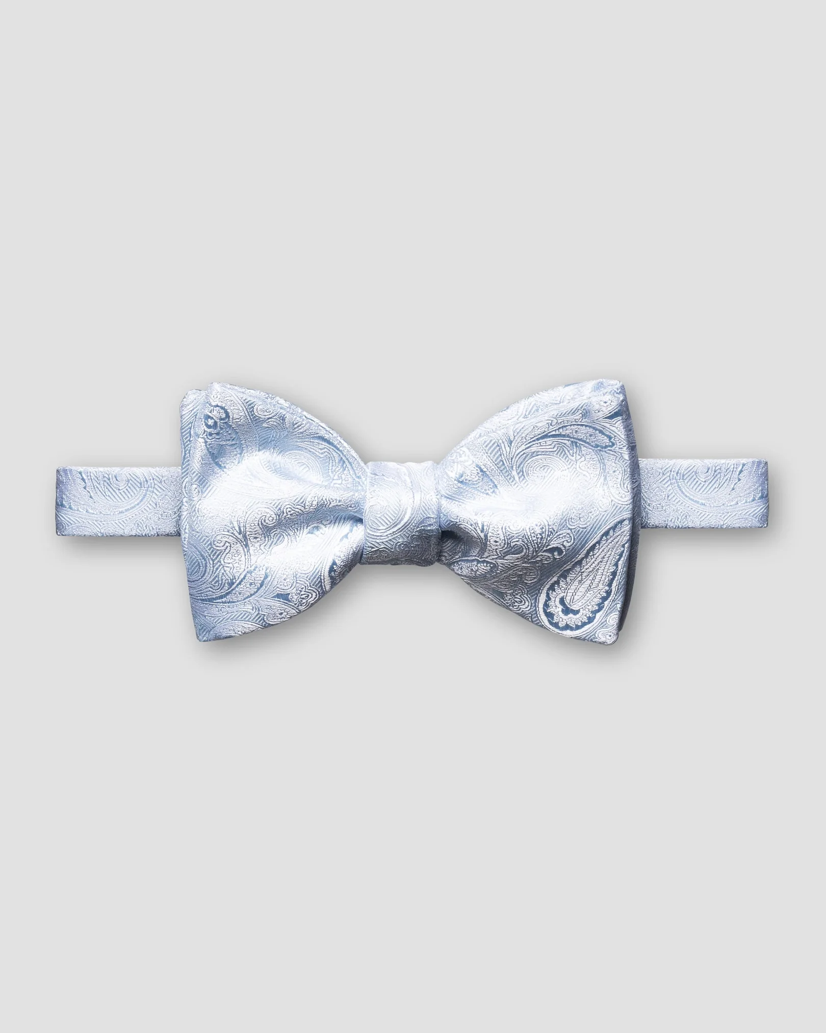 Eton - blue lustrous paisley bow tie self tied