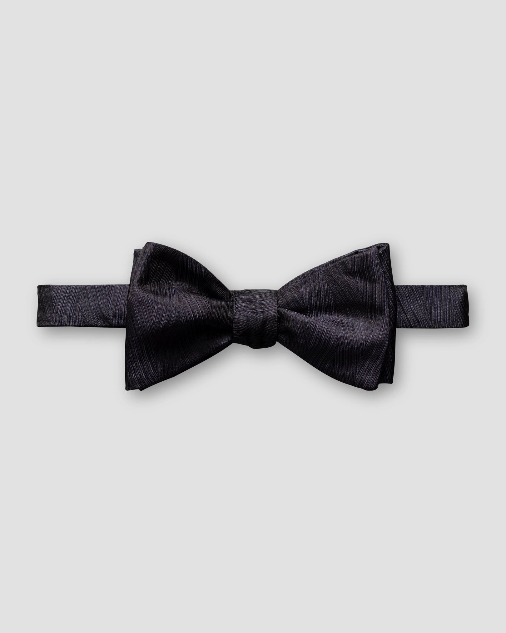 Eton - navy blue zig zag bow tie