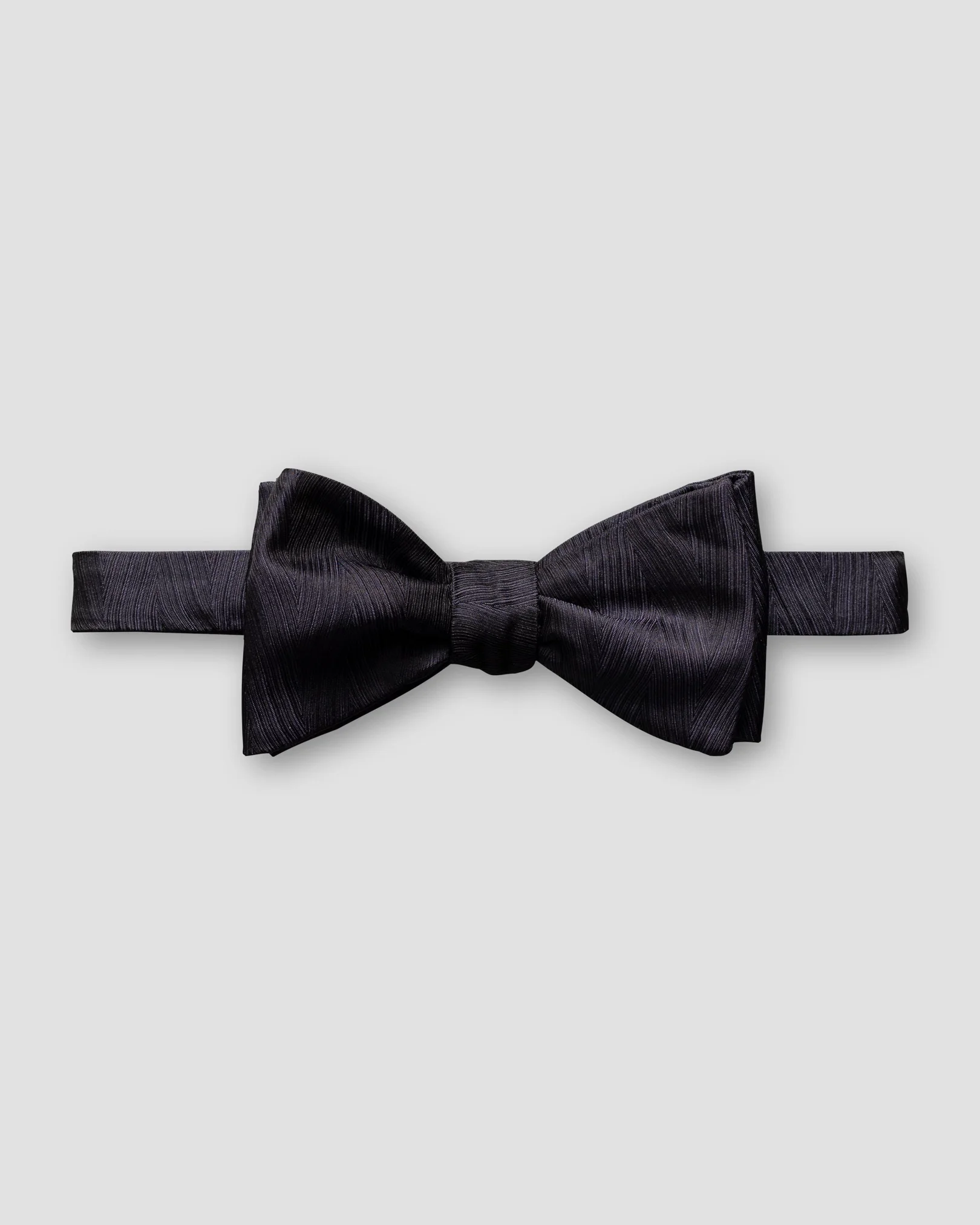 Eton - navy blue zig zag bow tie