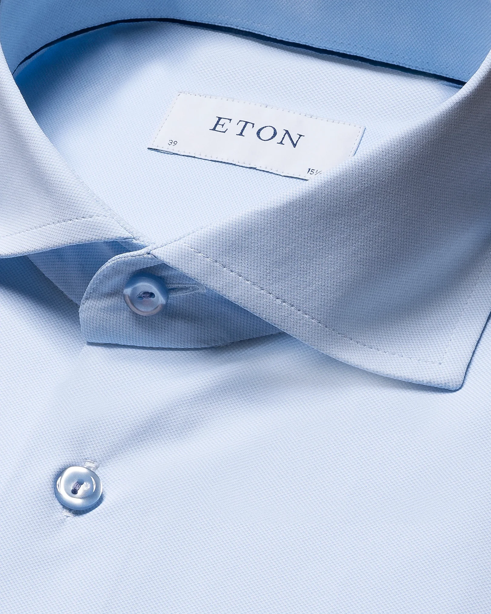 Eton - solid light blue four way stretch