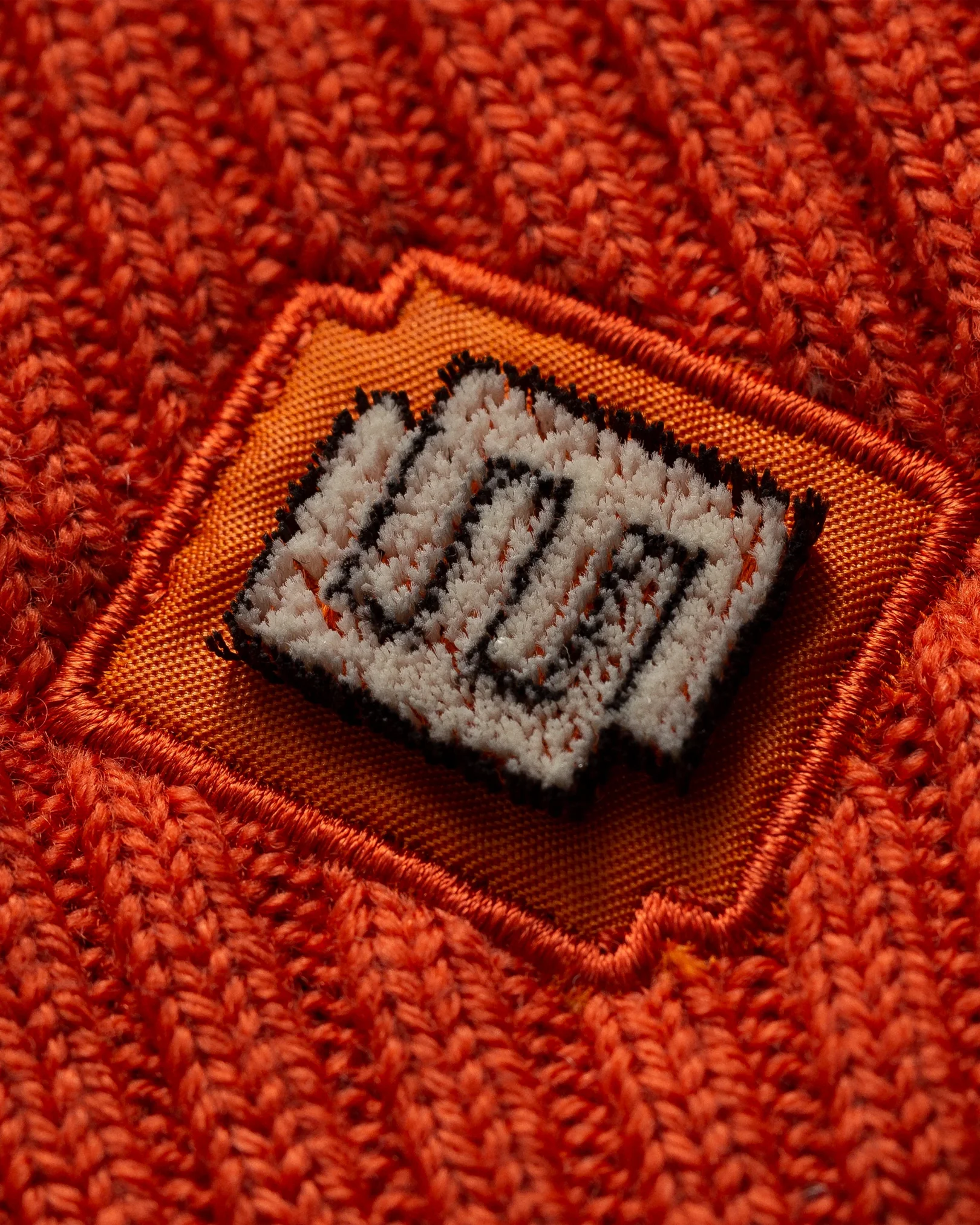 Eton - orange wool beanie logo detail