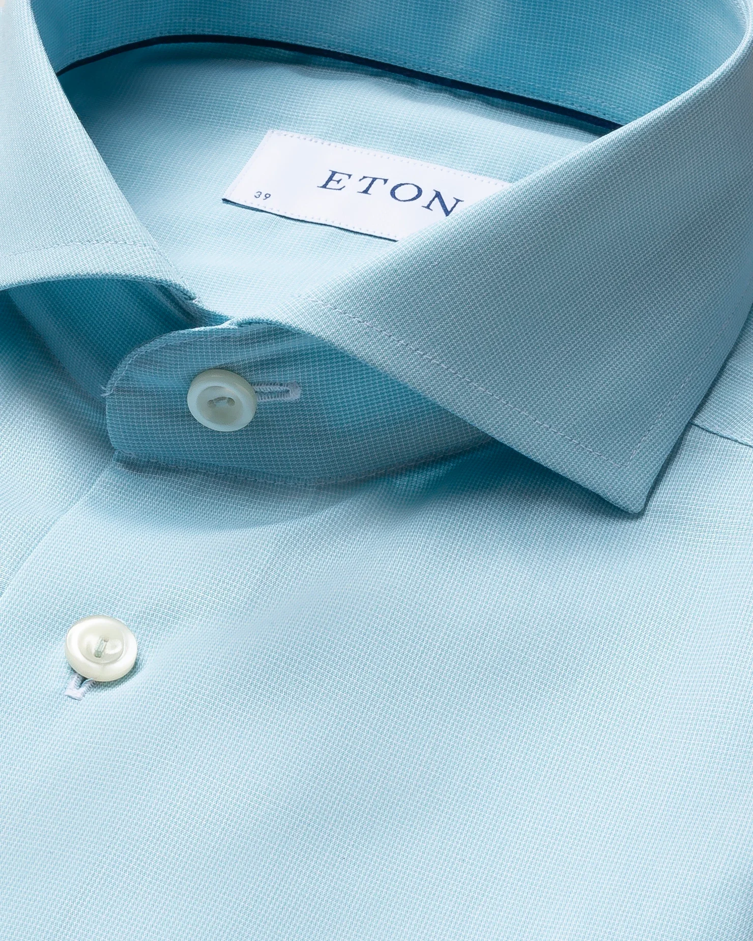 Eton - pastel green shirt navy details extreme cut away