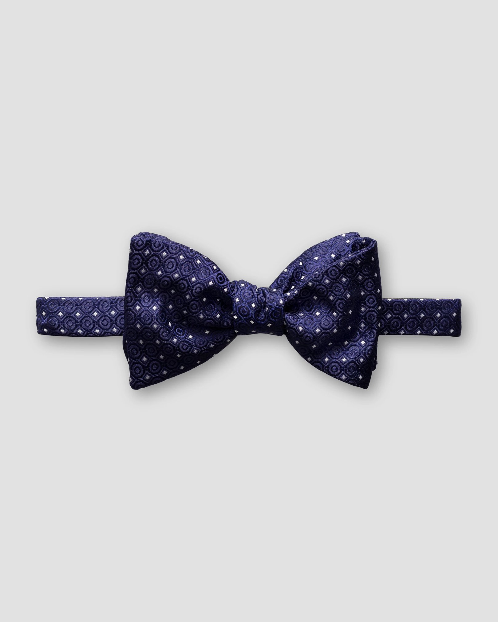 Eton - navy dotted bow tie self tied
