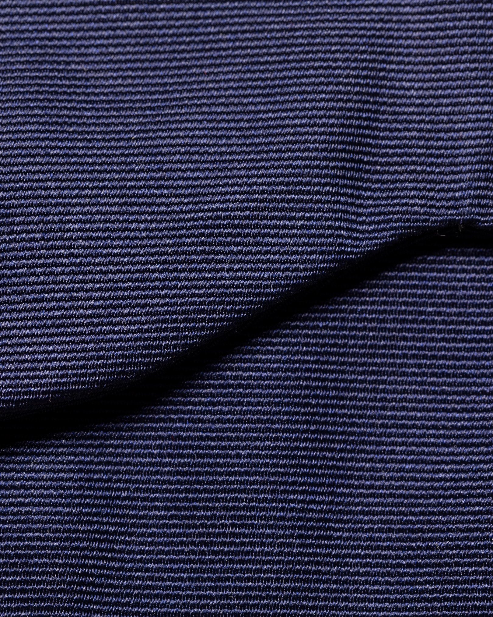 Eton - dark blue bow tie self tied dressed