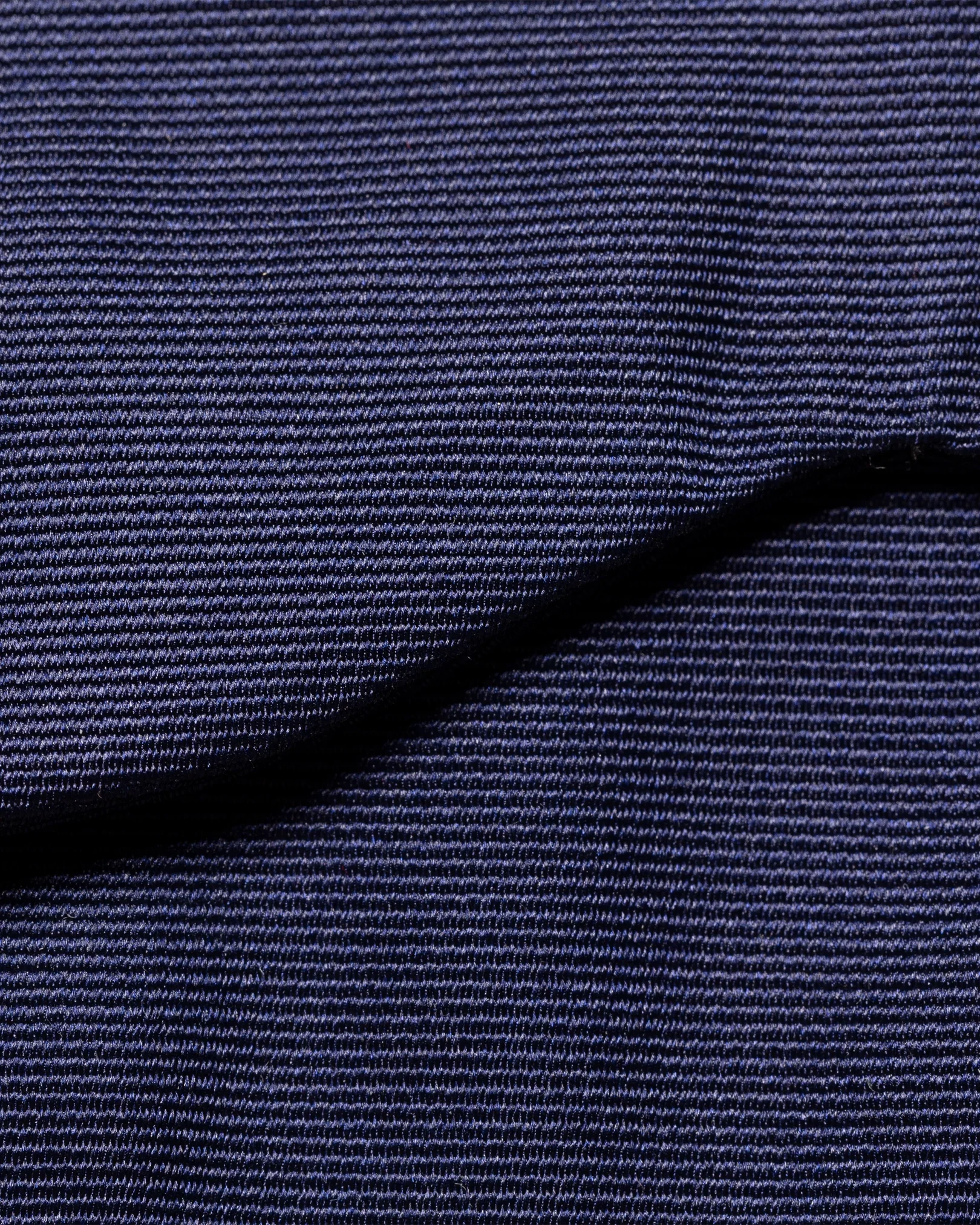 Eton - dark blue bow tie self tied dressed