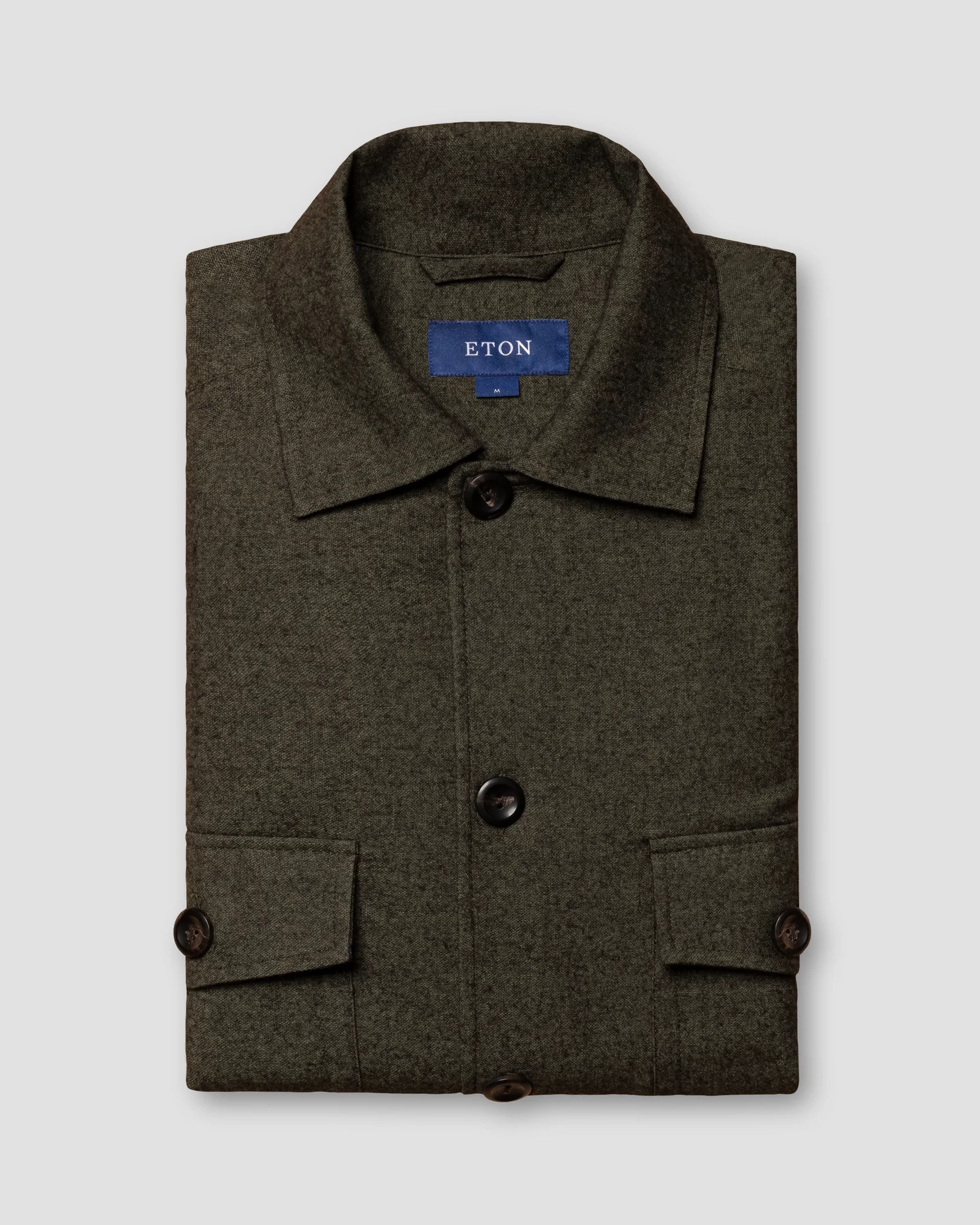 Eton - dark green flannel collar with no collarstand single cuff pointed strap regular