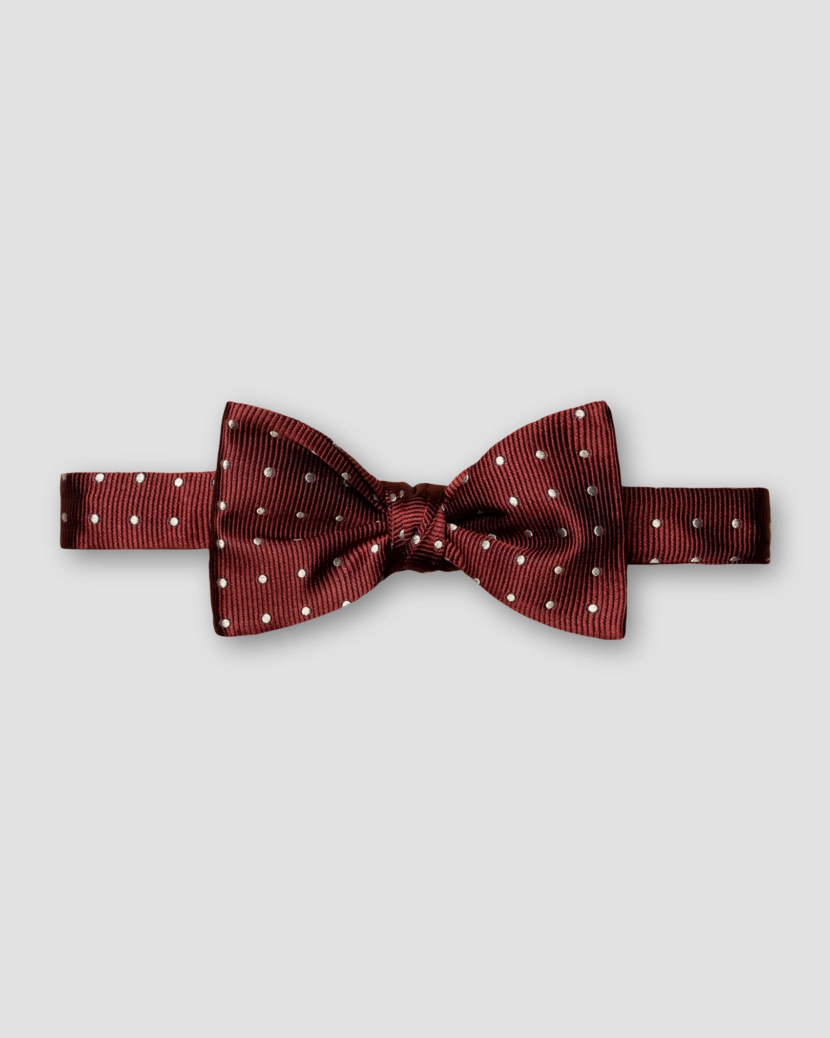 Eton - dark red bow tie self tied