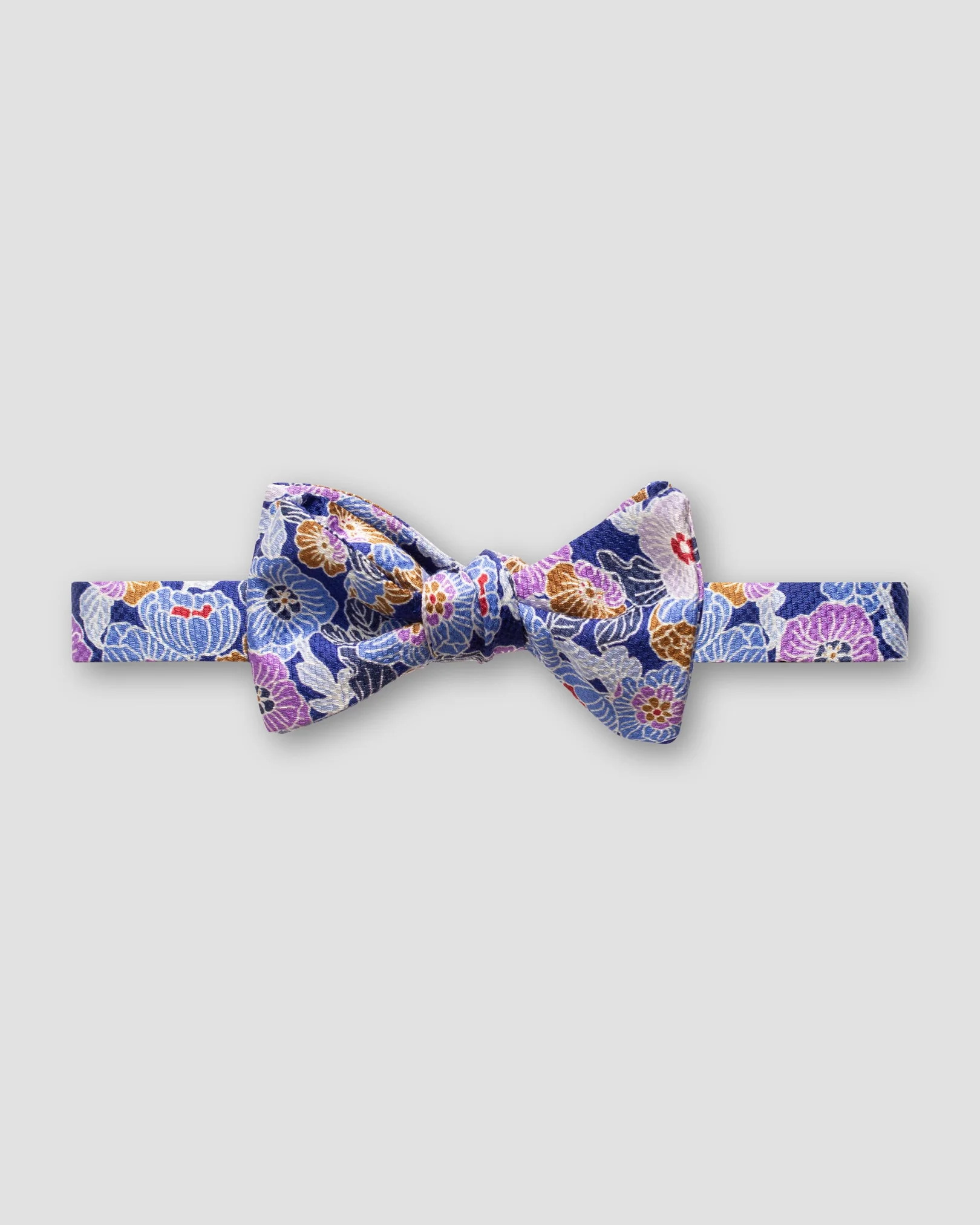 Eton - blue retro flower print bow tie self tied