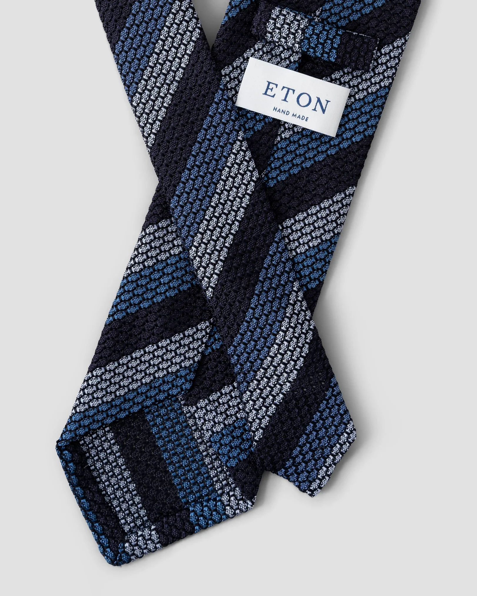 Eton - navy blue como tie