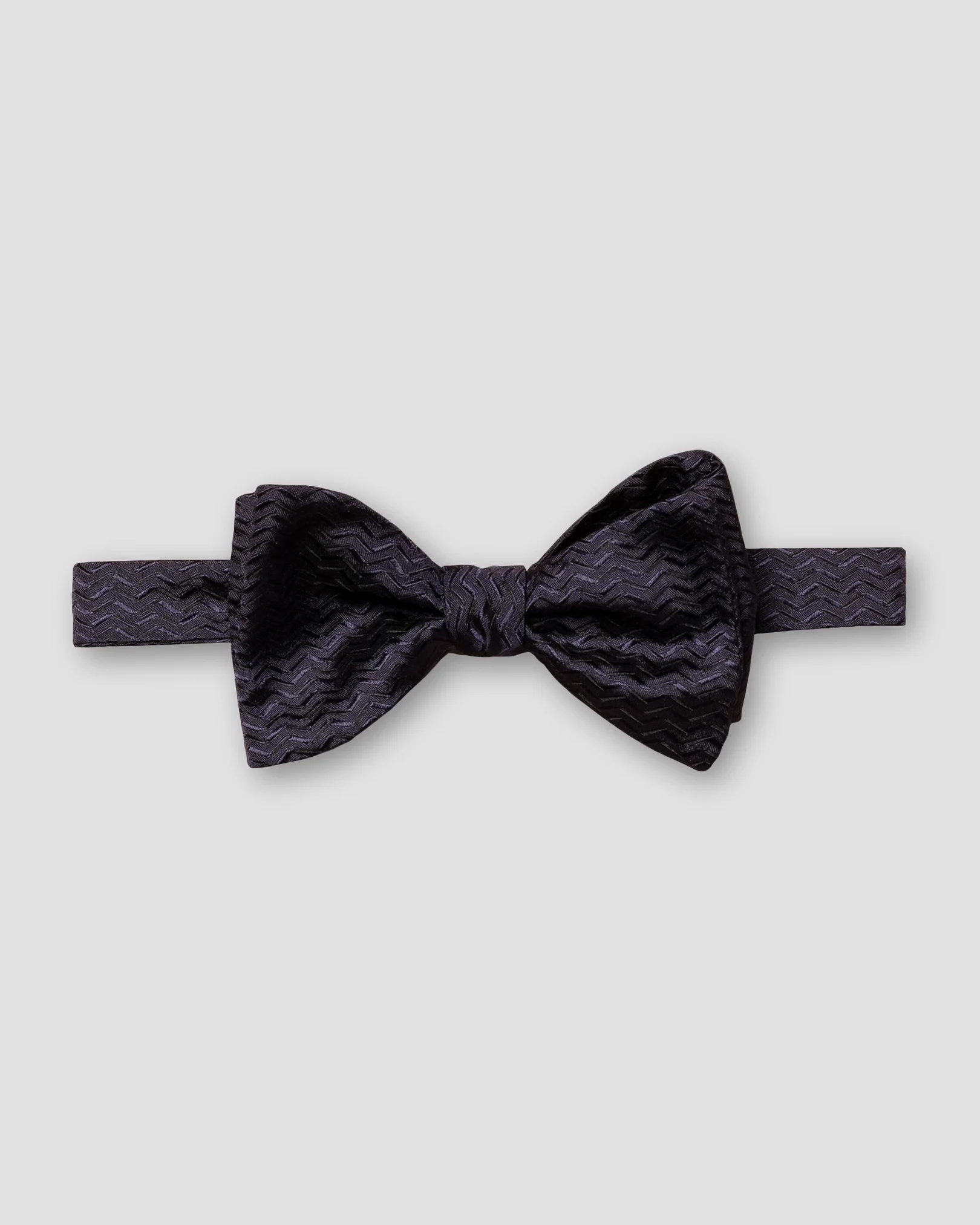 Eton - navy blue herringbone bow tie