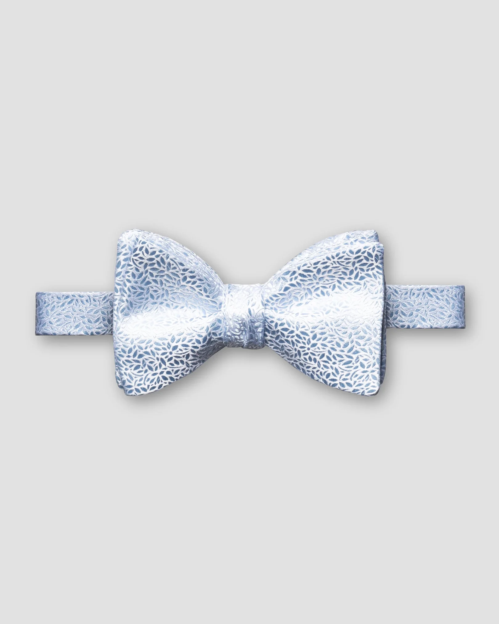 Eton - blue florals bow tie self tied