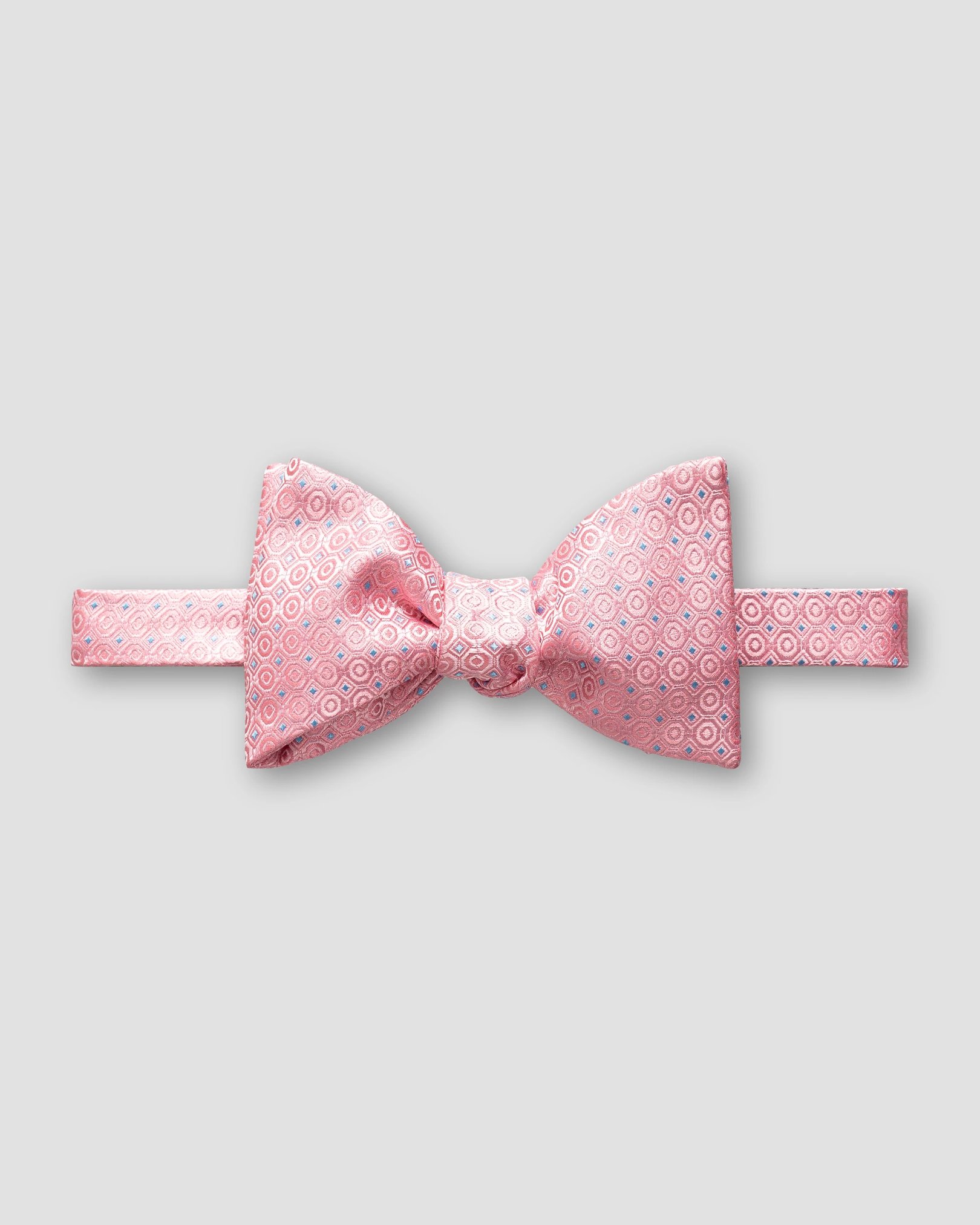 Eton - pink dotted bow tie self tied