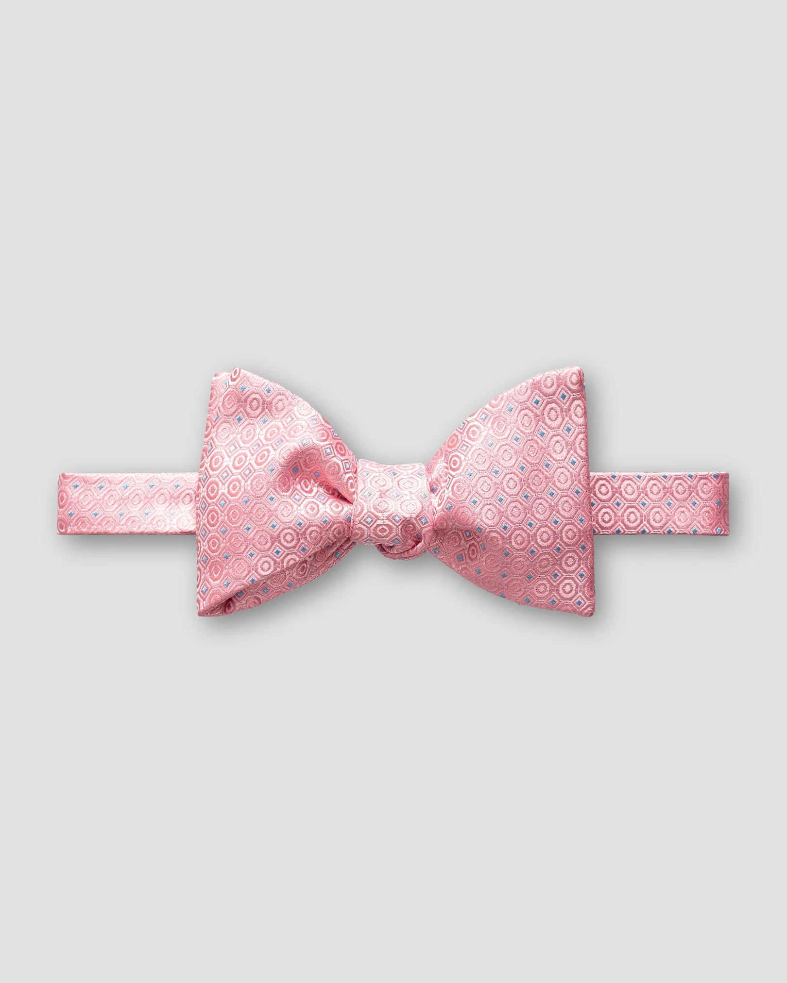 Eton - pink dotted bow tie self tied