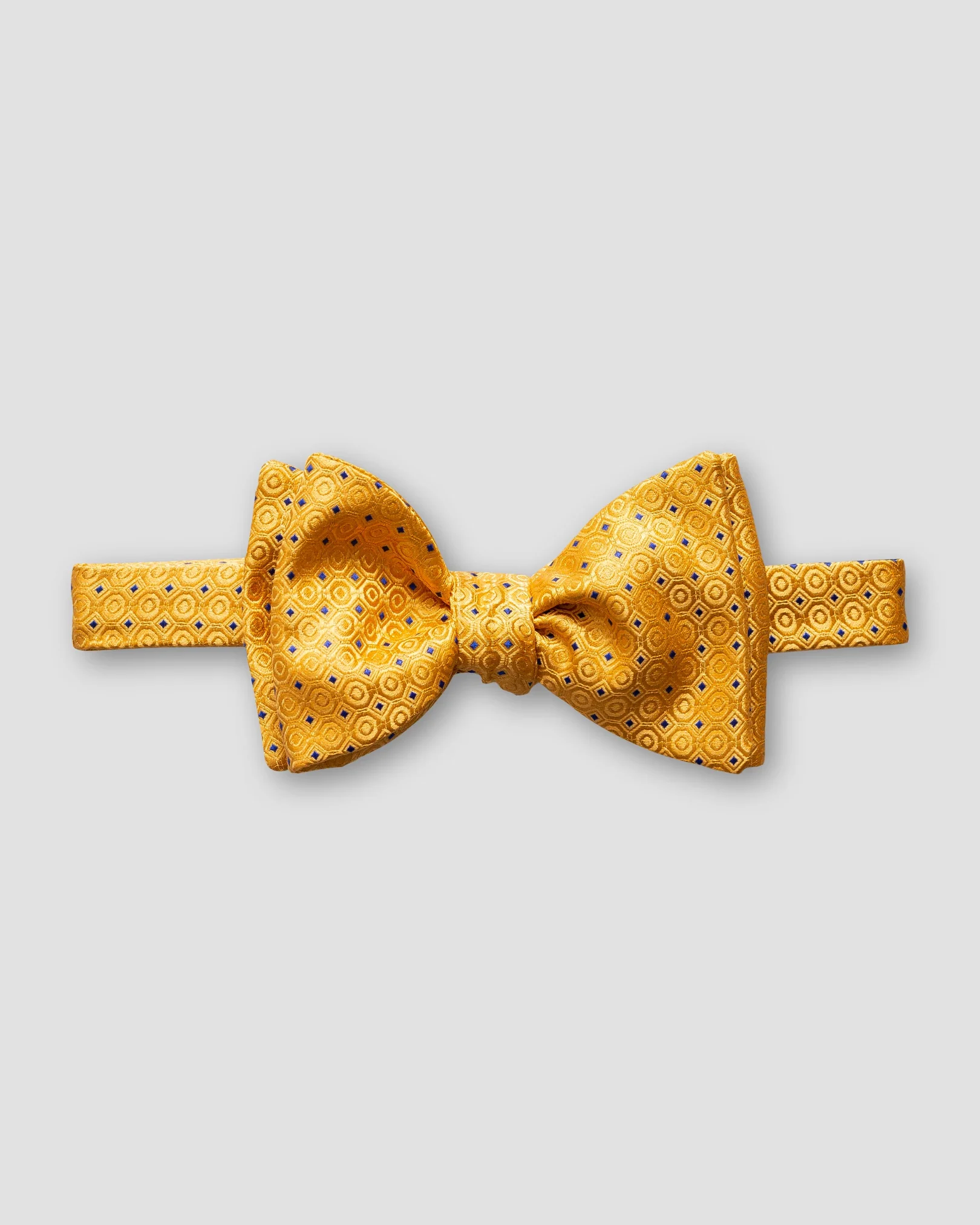 Eton - yellow dotted bow tie self tied