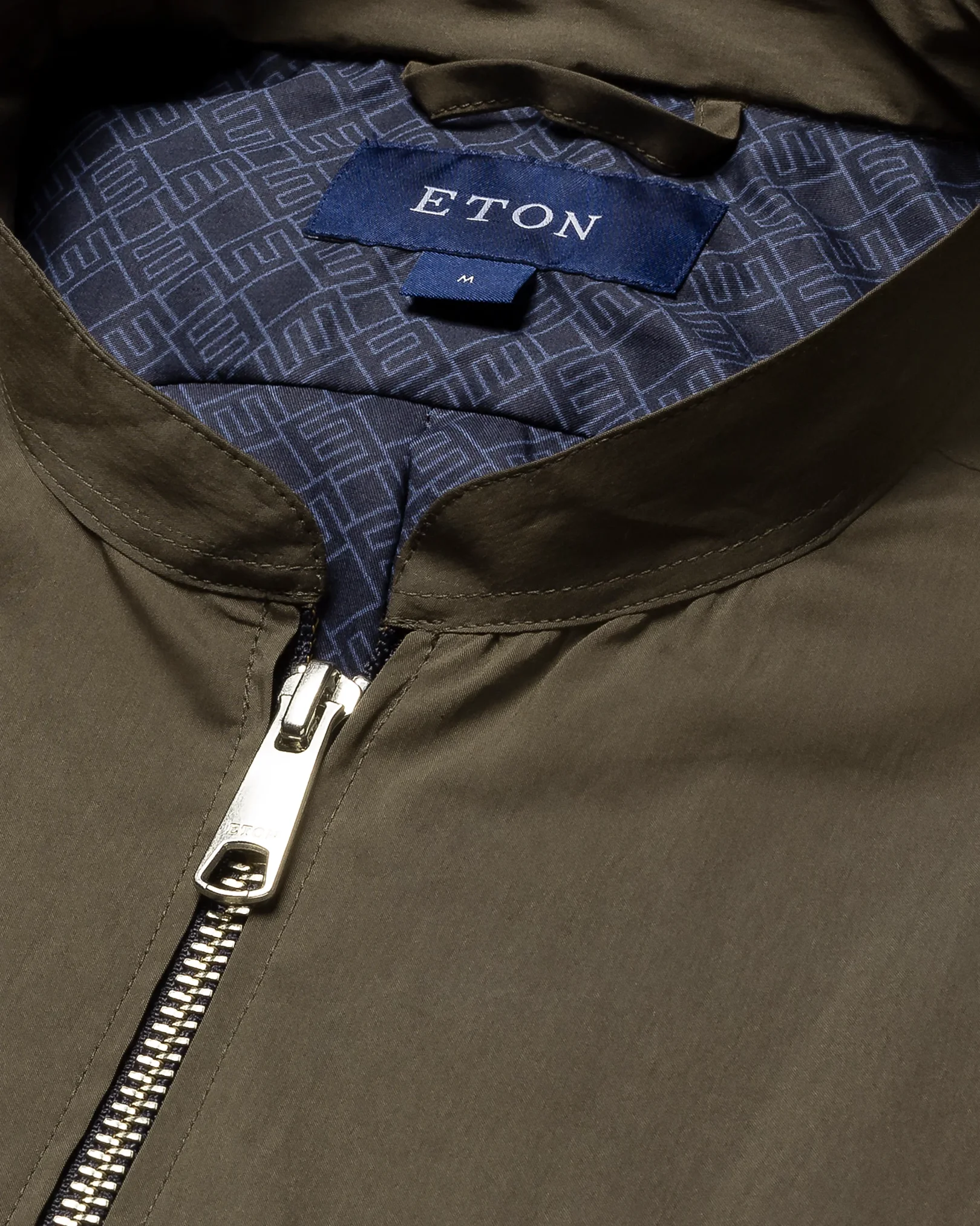 Eton - dark green cotton and nylon stand collar low sleeve less vest