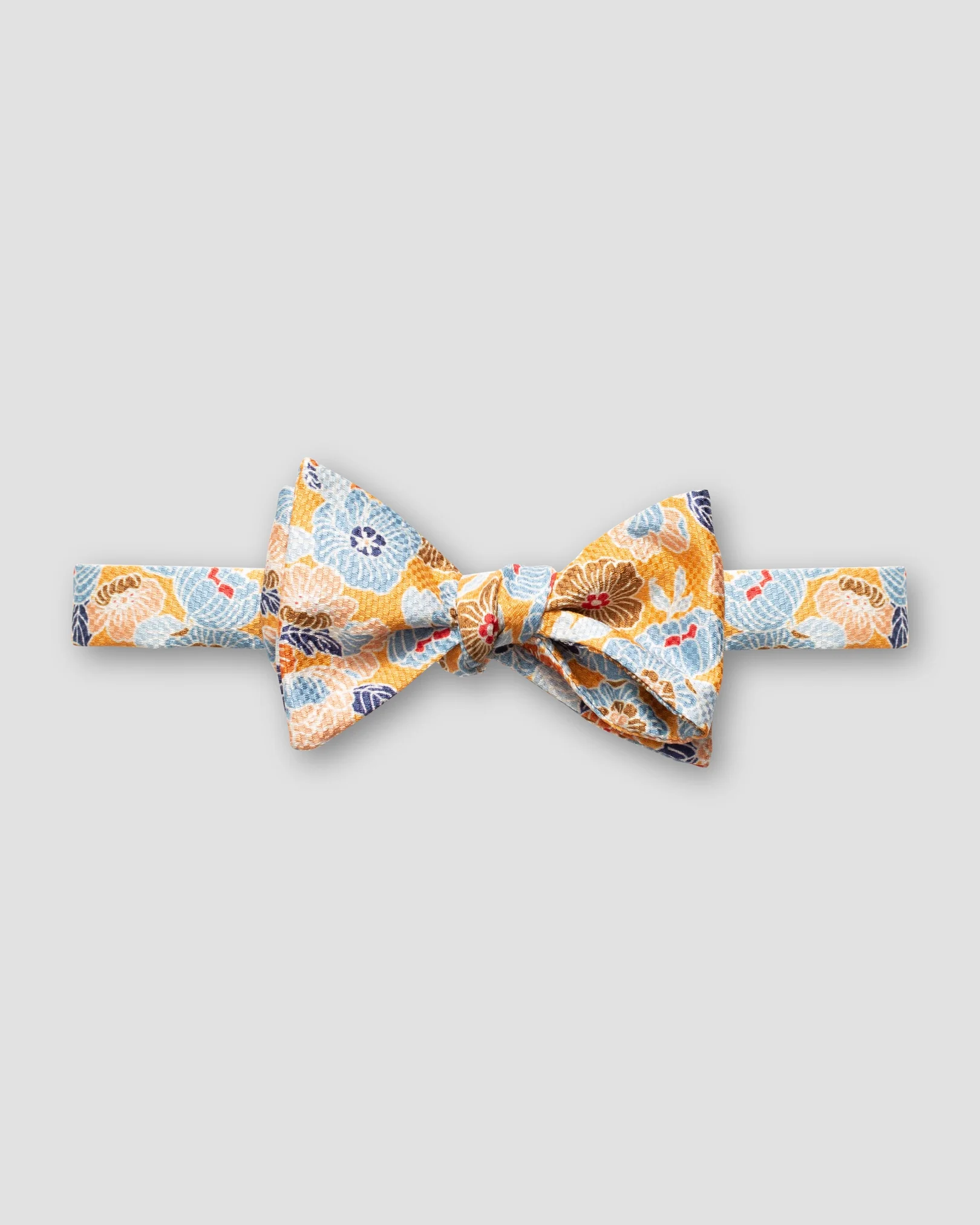 Eton - orange retro flower print bow tie self tied
