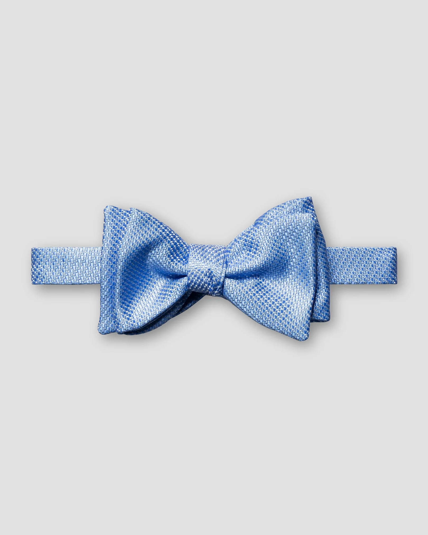 Eton - blue silk bow tie self tied